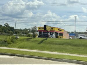 Waffle House Restaurant Storefront with Its Yellow Sign