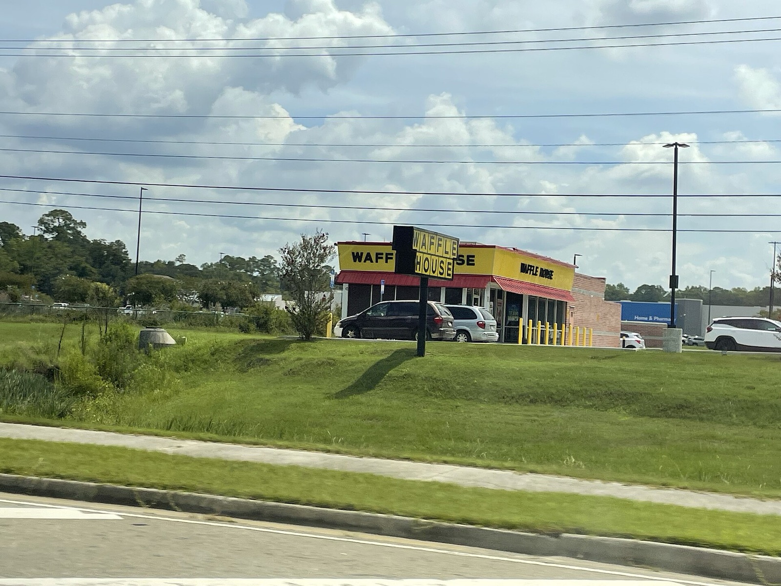 Waffle House Storefront - What's Vegetarian? Waffle House Restaurant Storefront with Its Yellow Sign