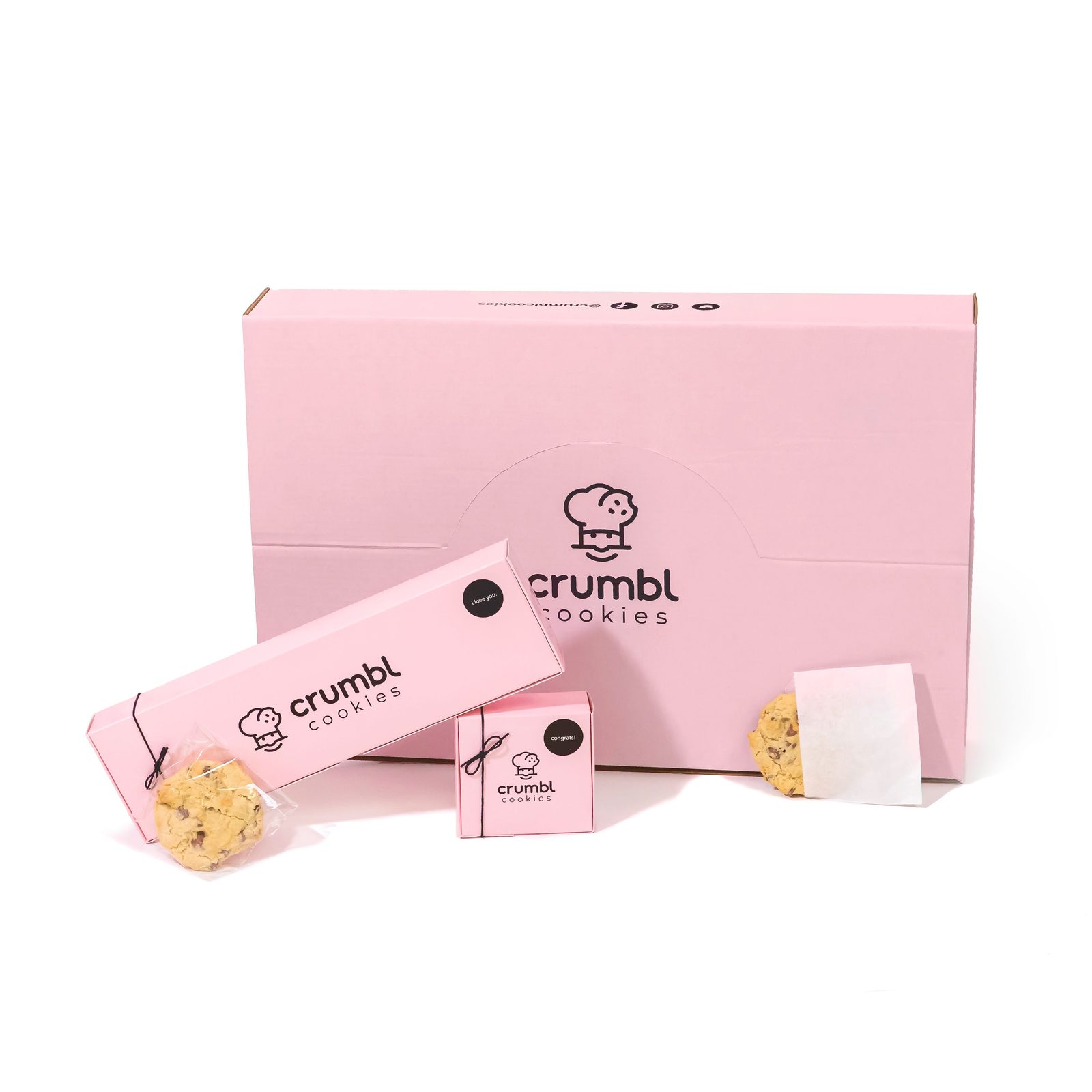 Crumbl cookies served in the brand’s signature pink boxes
