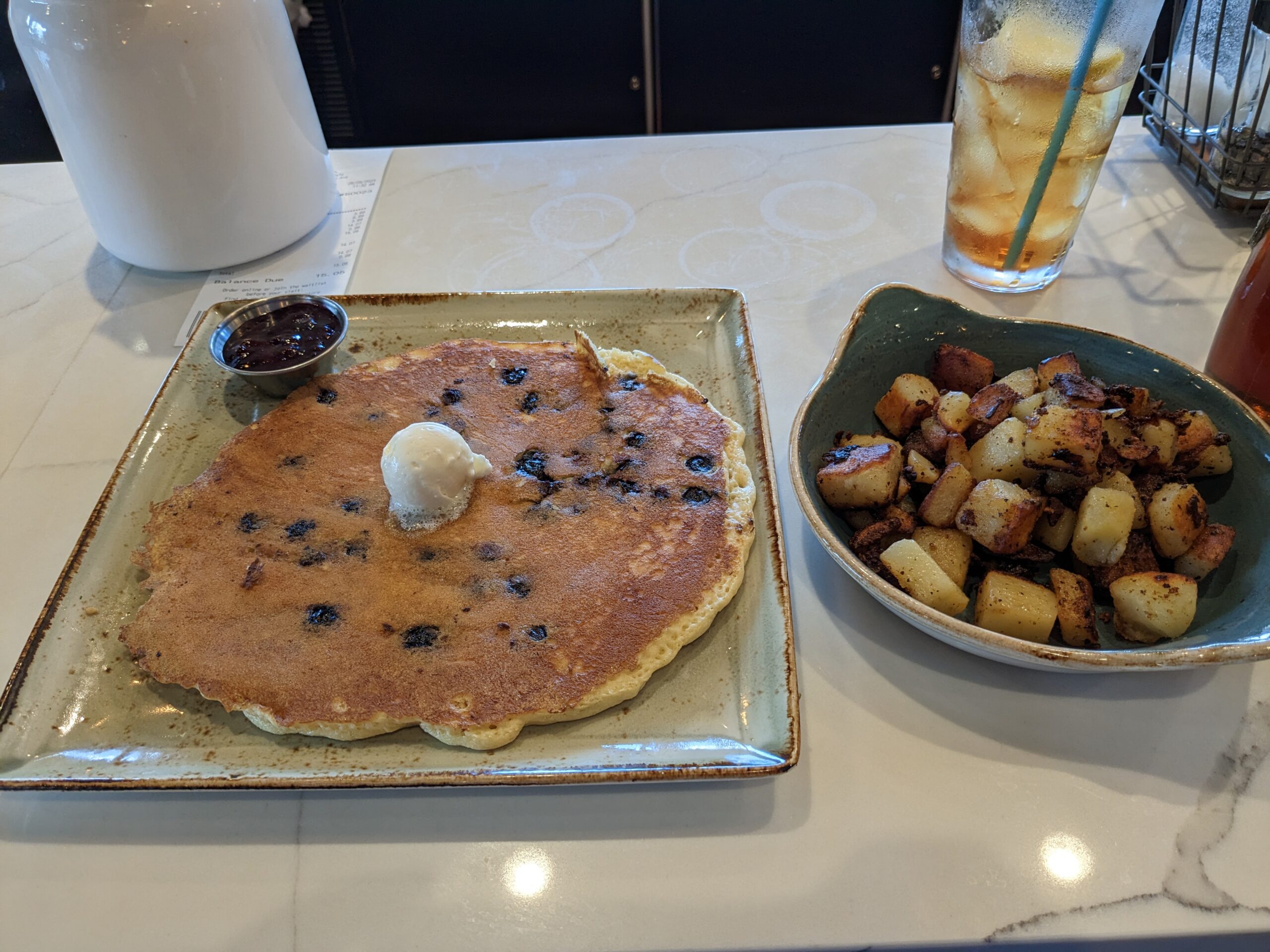 First-watch-blueberry-pancake-home-fries - What's Vegetarian? a Blueberry Pancake with Home Fries, One of the First Watch Vegetarian Options