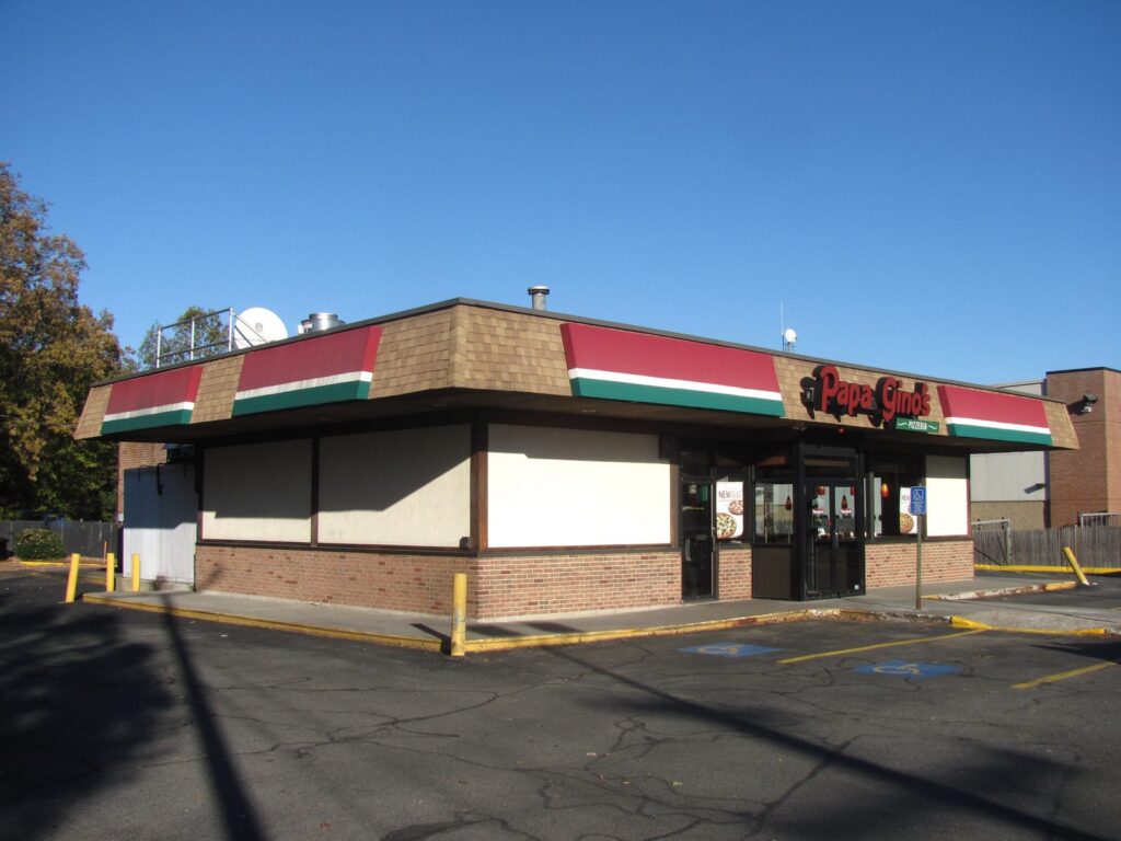Papa Gino's vegetarian options guide — a Papa Gino's pizzeria storefront in Bedford, Massachusetts