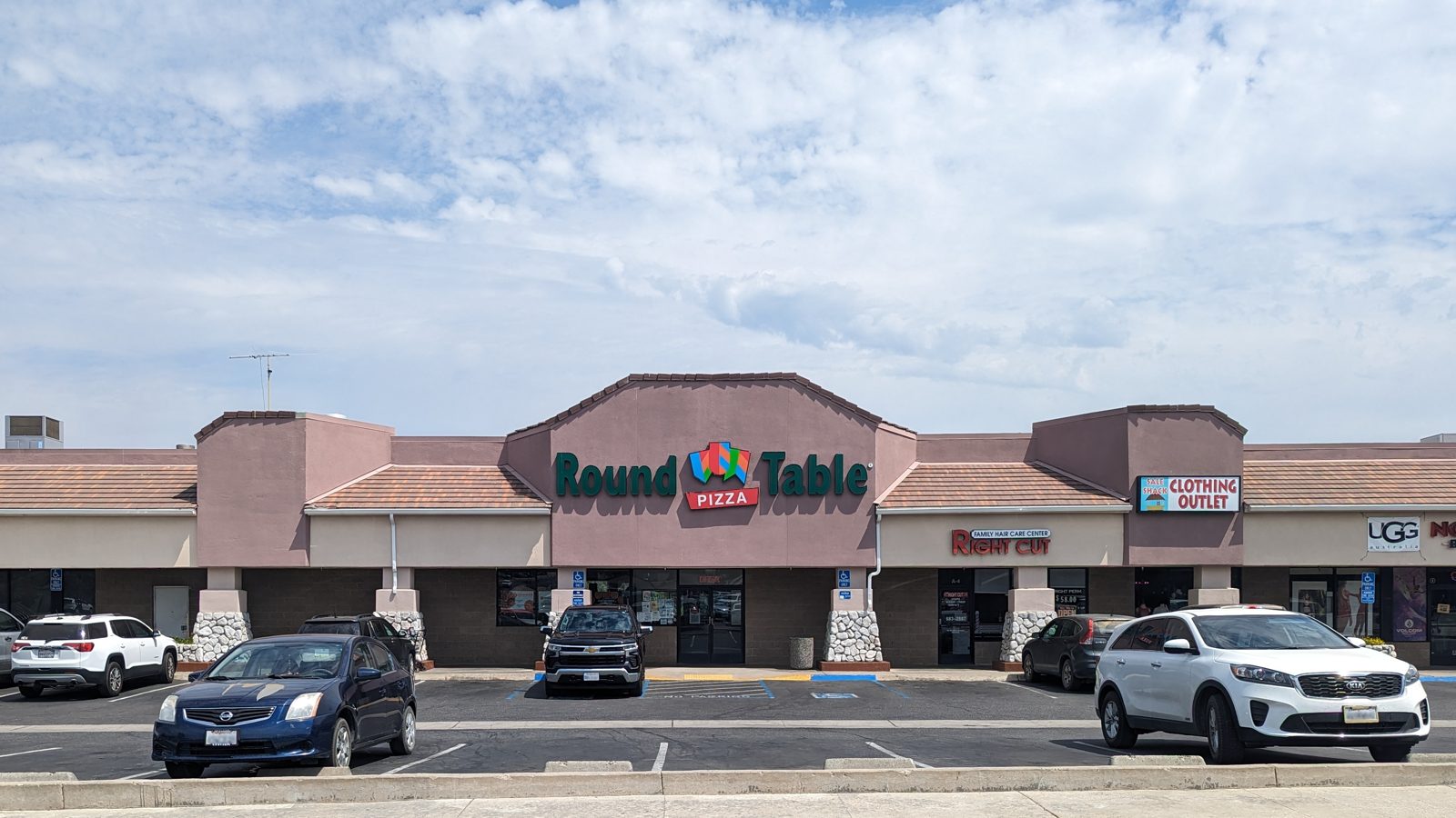 Round Table Pizza Vegetarian Options Storefront Sign