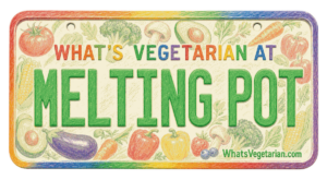 Colorful sign reading "WHAT’S VEGETARIAN AT MELTING POT" with vegetable illustrations around the border.