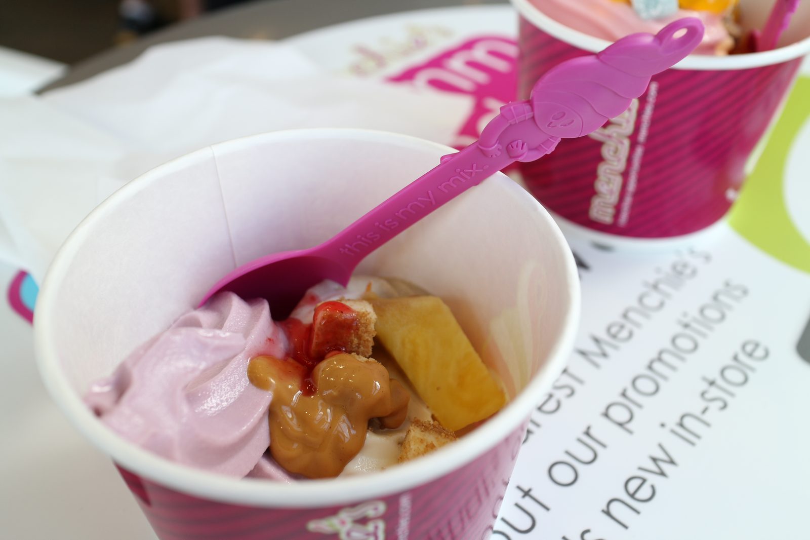 Menchie's vegetarian options include blueberry cheesecake and pina colada frozen yogurt