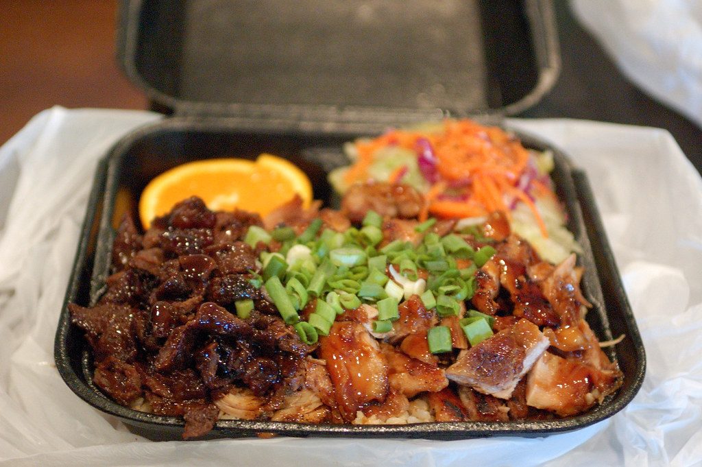 A WaBa Grill combo plate with grilled tofu and rice, one of the WaBa Grill vegetarian options