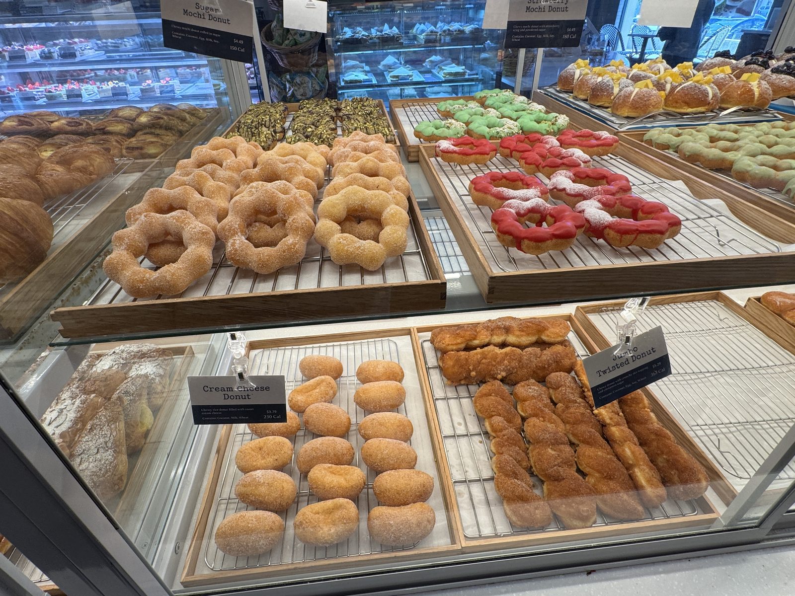 Paris Baguette vegetarian options pastry case with croissants and cakes