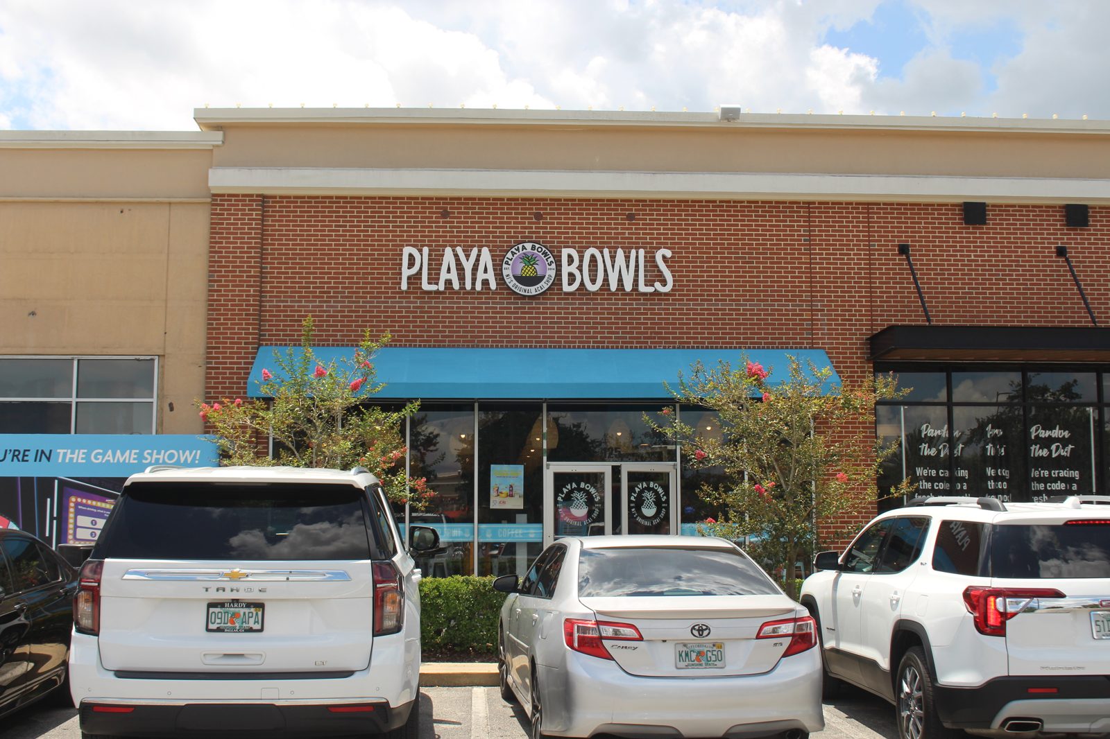 Playa Bowls storefront sign at a shopping center