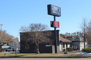 Sonny's BBQ restaurant exterior, where diners can find Sonny's BBQ vegetarian options on the sides menu