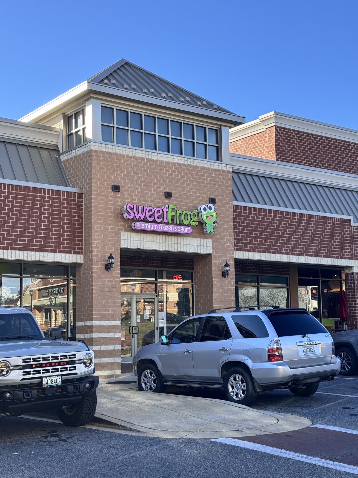 Sweet Frog frozen yogurt storefront exterior