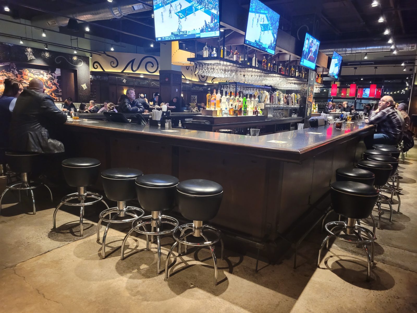 Bar Louie vegetarian options start at the bar and dining room, shown at the East Brunswick location