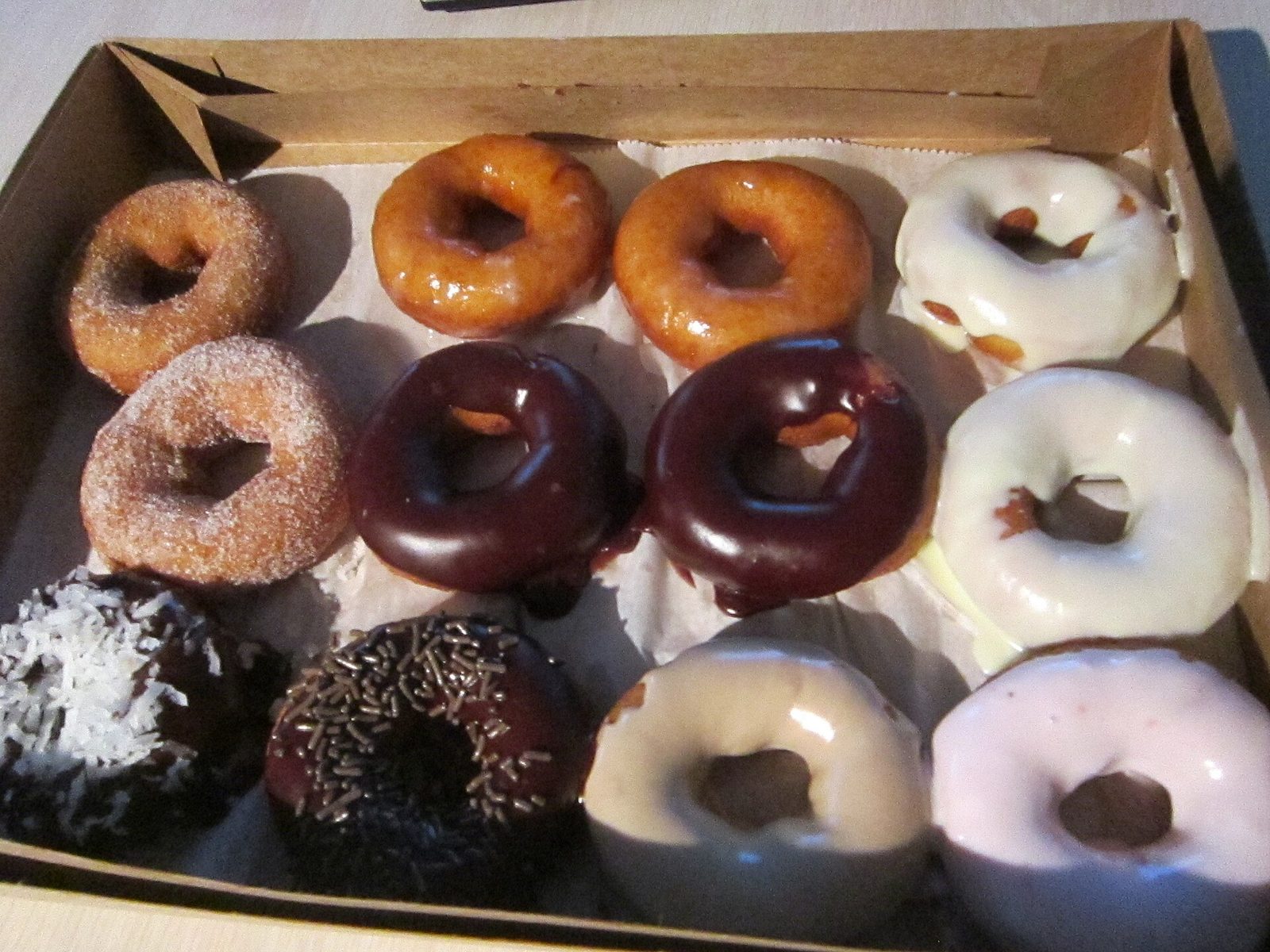 Duck Donuts vegetarian options: a box of cinnamon sugar, glazed, chocolate and iced donuts